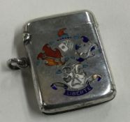 A silver vesta case with enamelled decoration entitled 'Liberte'.