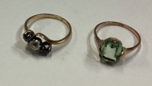 Two 9 carat gem set rings.