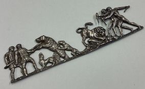 A large Victorian silver plaque cast with fighting scenes.