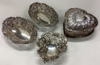 A pair of silver bon bon dishes together with a heart shaped box etc.