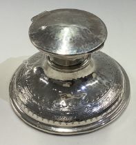 An Arts and Crafts silver inkwell. Birmingham 1919.