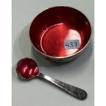 A Danish silver and red enamelled salt and spoon.