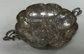 A 17th Century German silver wine taster. Marked to side.