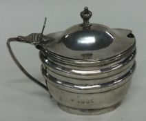 A Georgian silver mustard pot with BGL. London 1806.