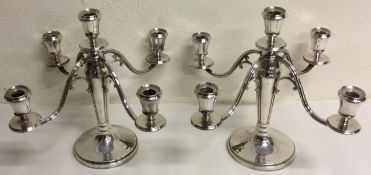 A large oversized pair of early 20th Century Dutch silver candelabra.