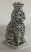 A silver scent bottle with screw top lid in the form of a cat.