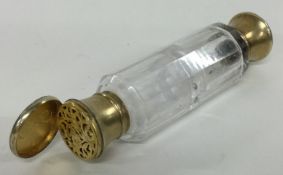 A silver gilt and glass combination vinaigrette / scent bottle. London 1860. By Thomas Johnson.