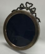 A silver photo frame pierced with swags. Birmingham 1902.