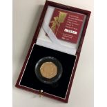 A Queen Elizabeth II 22 carat gold Proof coin numbered 0652.