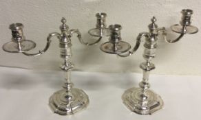 A large pair of Georgian style silver candelabra. London 1987.