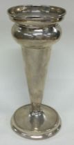 CHESTER: A silver vase.