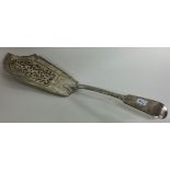 A Victorian silver fish slice with pierced decoration. London 1865.