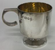 A silver mug with gilt interior. London 1988. By Garrard & Co.