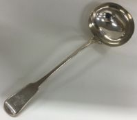 A large 18th Century Georgian silver soup ladle with crested terminal. London 1798.