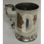 A large heavy 18th Century Georgian silver pint mug. London 1772. By Charles Wright.