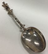 A Victorian silver spoon with figural decoration bearing import marks.