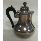 A French silver teapot.