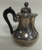 A French silver teapot.