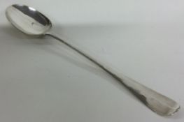 An early Georgian silver rat tail basting spoon. London 1716.