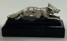 A silver figure of a fox on plinth. London 1977.