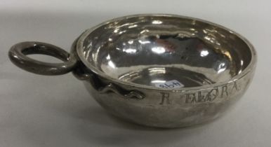 An 18th Century French silver wine taster. Makers mark struck thrice. By MF.