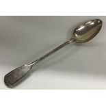 A large Georgian silver basting spoon. London 1822. By William Eley & William Fearn.
