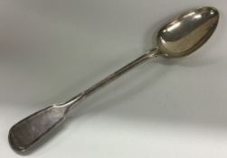 A large Georgian silver basting spoon. London 1822. By William Eley & William Fearn.