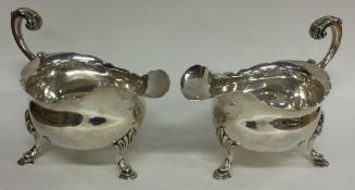 A pair of 18th Century Georgian silver sauceboats. London 1766. By William & James Priest.