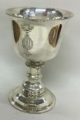 A large silver goblet with engraved crest of Columbia. London 1941.