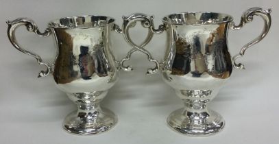 DUBLIN: A good pair of 18th Century Irish silver cups. Circa 1780. By Matthew West.