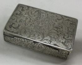 A Victorian silver snuff box with chased decoration bearing inscription. Birmingham 1840.