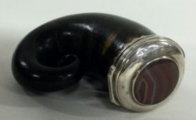 A 19th Century silver mounted snuff mull with hinged lid and gem stone to centre.