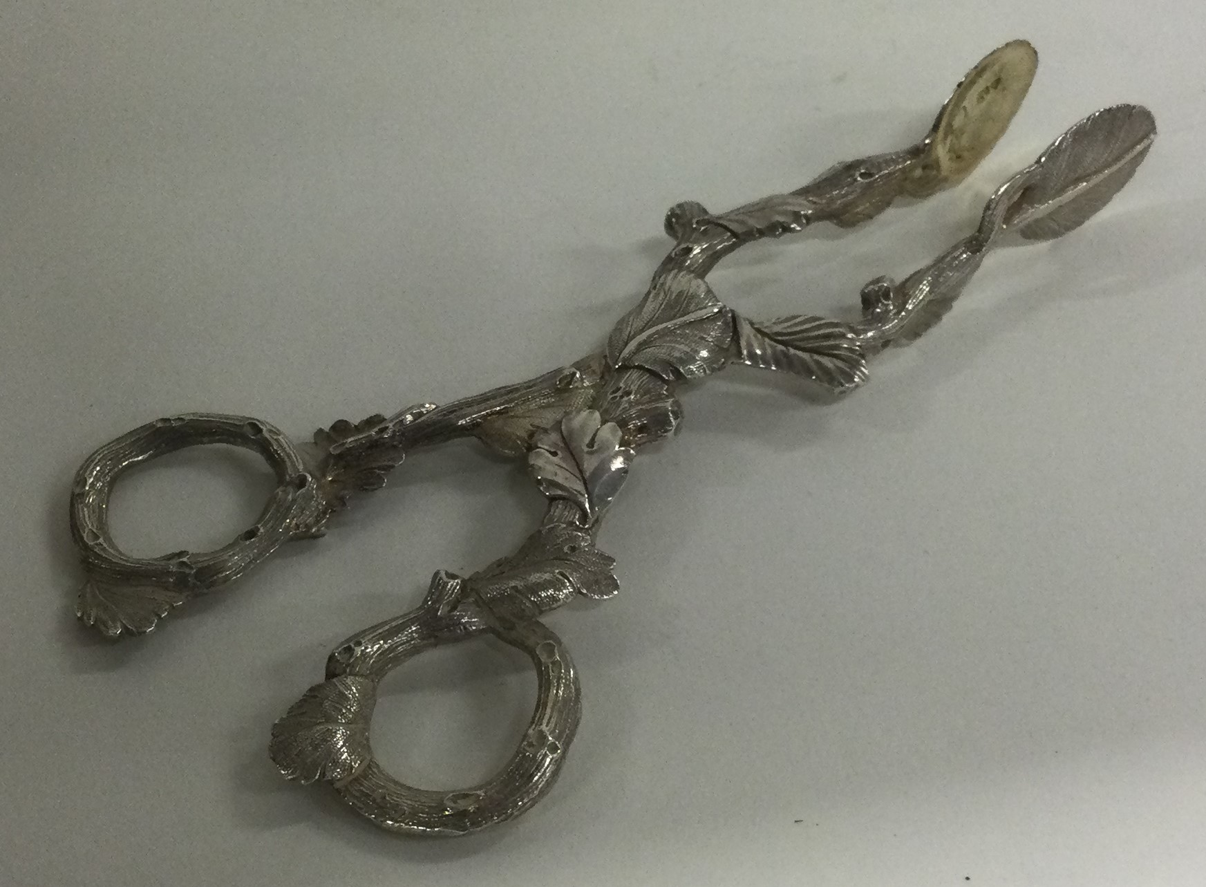 A pair of Victorian silver grape scissors. 1857.