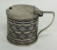 A pierced silver mustard pot with BGL. Birmingham 1899.
