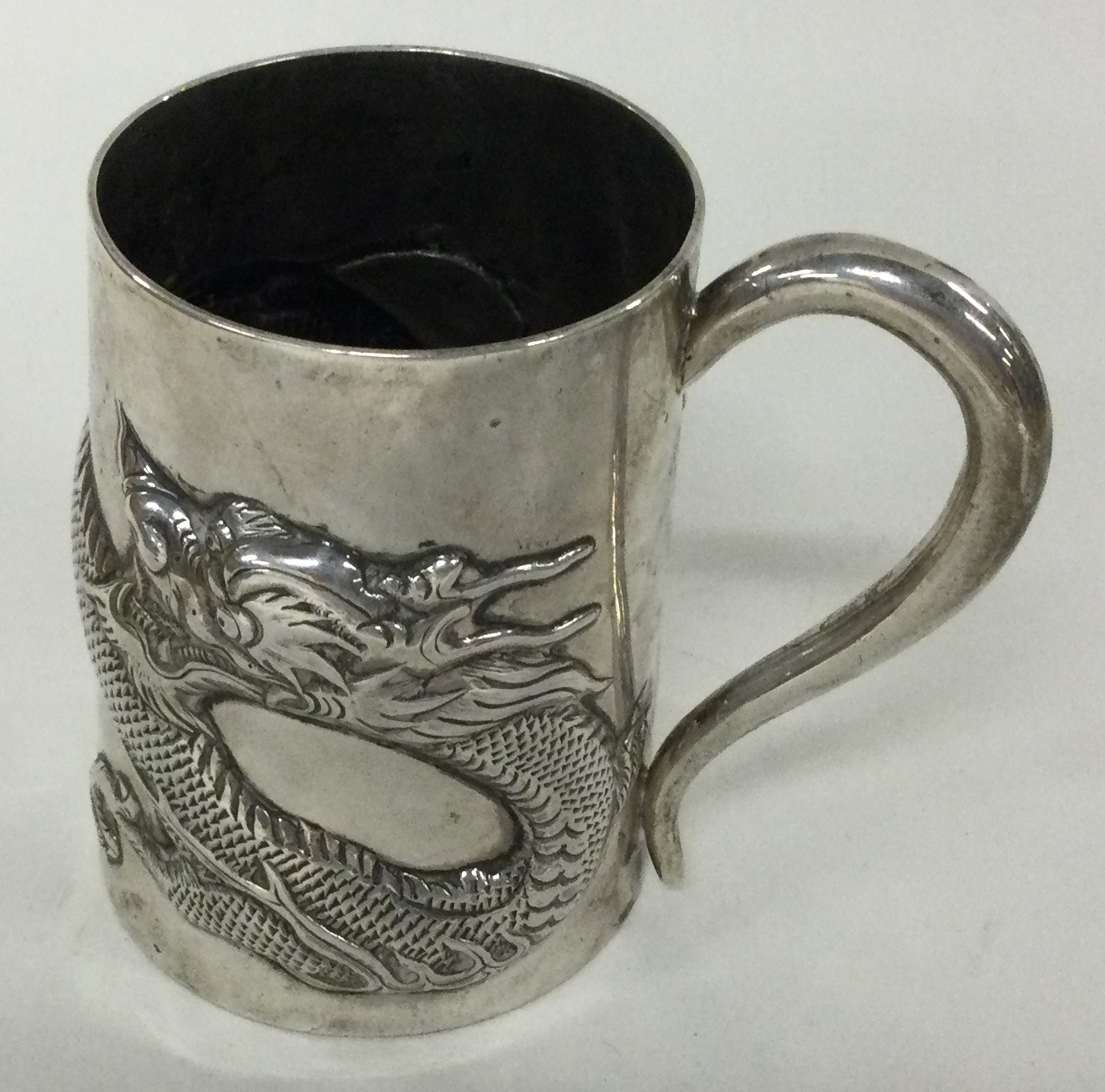 WANG HING: A Chinese silver export mug.