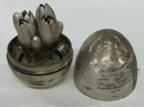 A contemporary English silver 'Surprise' egg. Marked to base.