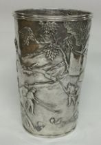 WANG HING: A Chinese export silver beaker decorated with farm scene.