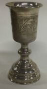An early 20th Century Russian silver Judaica kiddush cup.