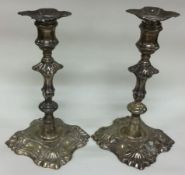 A pair of 18th Century Georgian cast silver candlesticks. London 1764. By William Cafe.