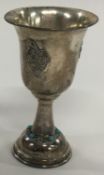 A Judaica silver goblet with stones.