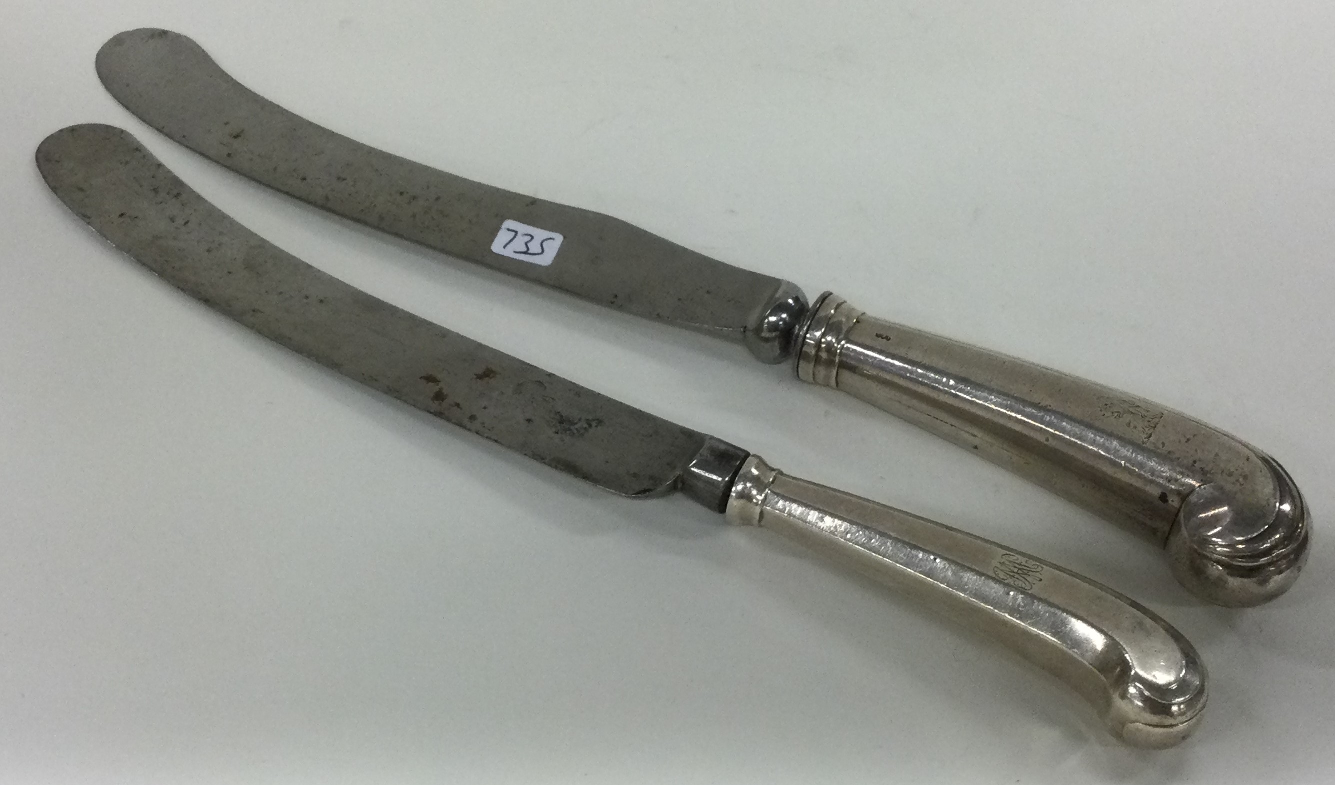 A pair of 18th Century Georgian silver pistol ended knives.