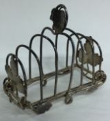 A novelty Victorian silver toast rack cast with leaves. Birmingham 1849. By Yapp & Woodward.