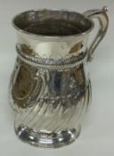 A Victorian silver baluster mug. London 1883. By Charles Stuart Harris.