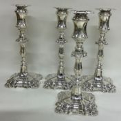 A set of four Victorian silver candlesticks. Sheffield 1896. By Walker & Hall.