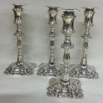 A set of four Victorian silver candlesticks. Sheffield 1896. By Walker & Hall.