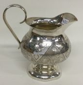 A 19th Century Russian silver jug. Marked to base.
