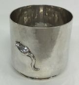 GUILD OF HANDICRAFT: A novelty hammered silver beaker embossed with a mouse.