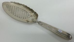 An 18th Century Georgian pierced silver fish slice. London 1788.