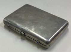 A novelty English silver combination cigarette case / compact decorated with stones.