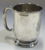 A silver christening mug. Birmingham 1928.